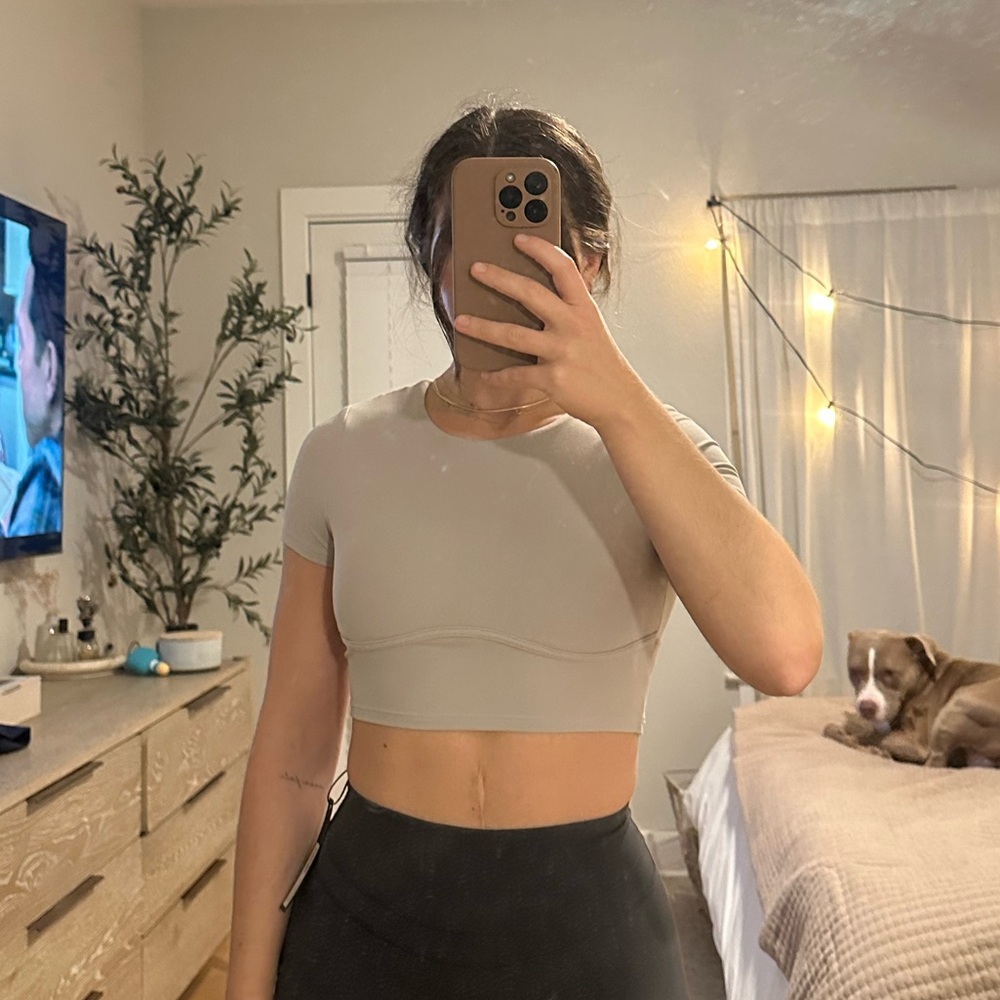 Kamo Fitness Grey backless cropped top with removable pads.